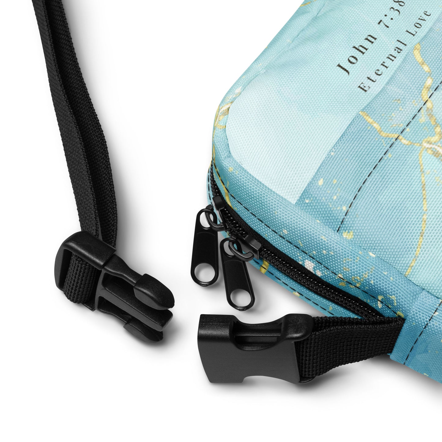 Close-up of a blue pouch with text and a black strap on a white background