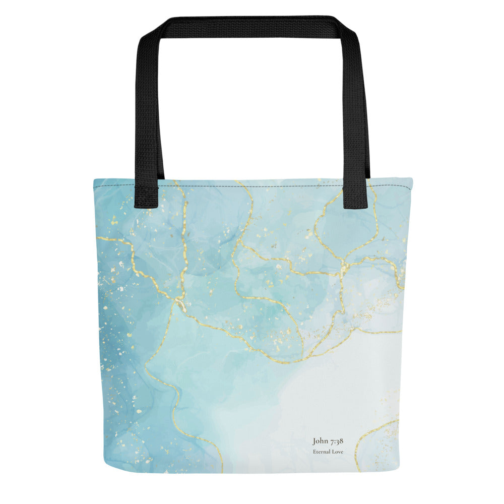 Front view of the Living Waters tote bag with black handles, turquoise and gold design, John 7:38.